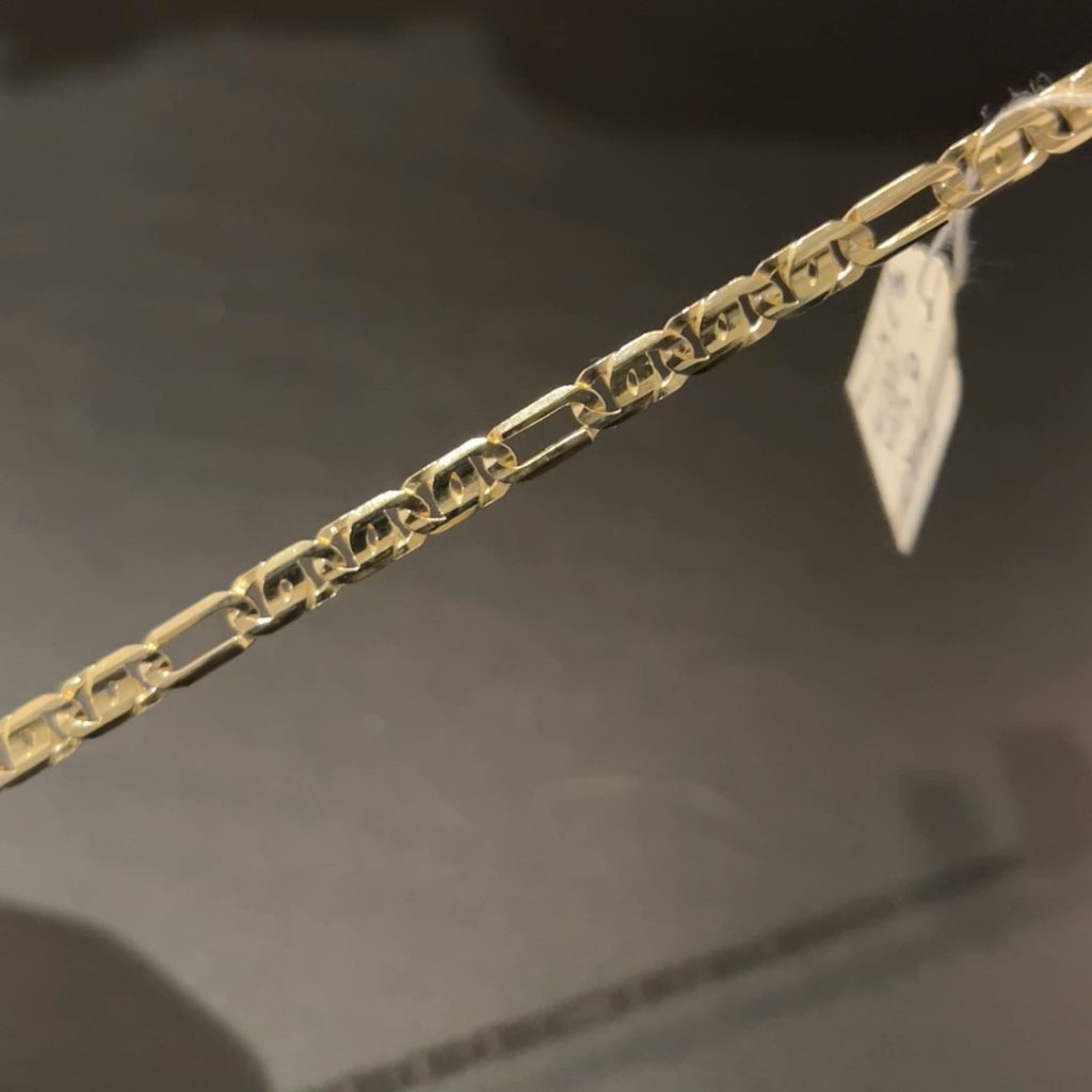 GUA-310 Geelgouden valkenoog / figaro armband 14 Kt 18 cm