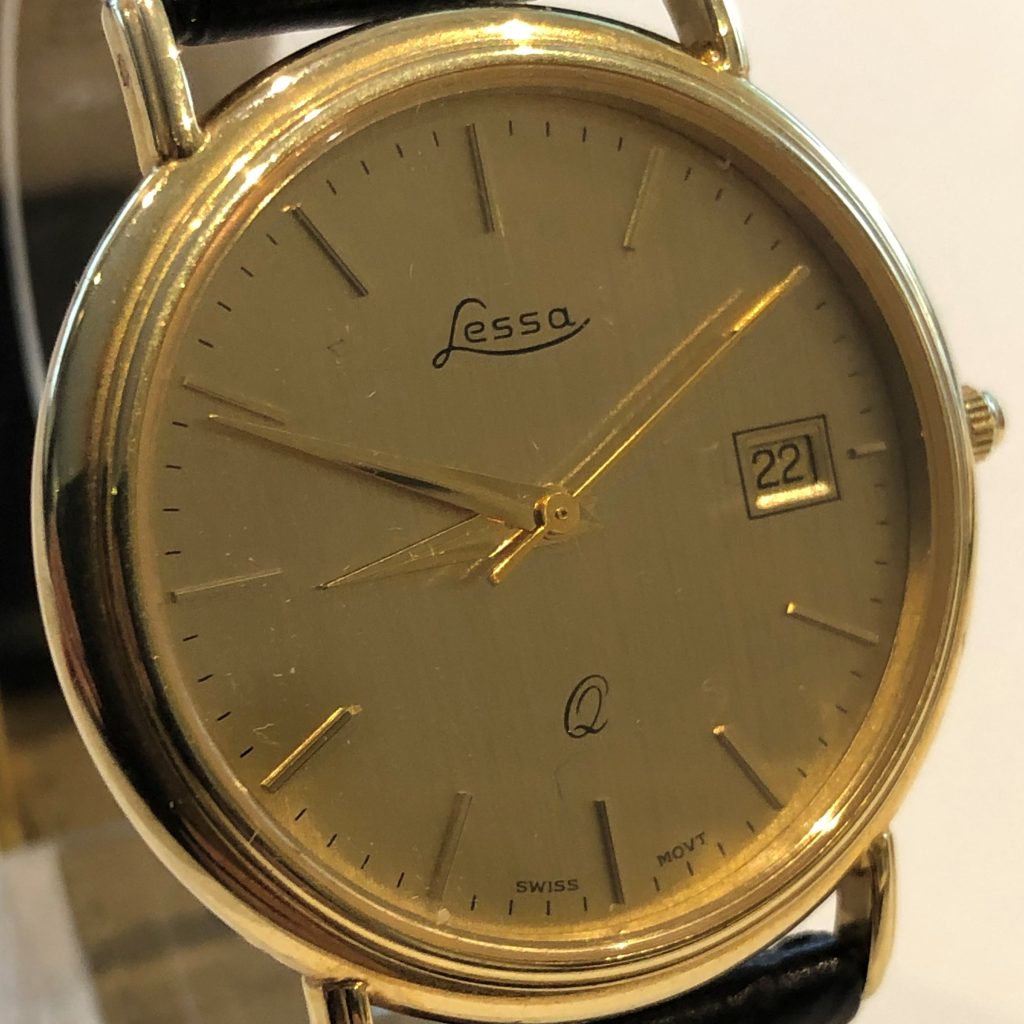 GUH-396 14 kt gouden horloge met ronde kast merk Lessa met datum aanduiding